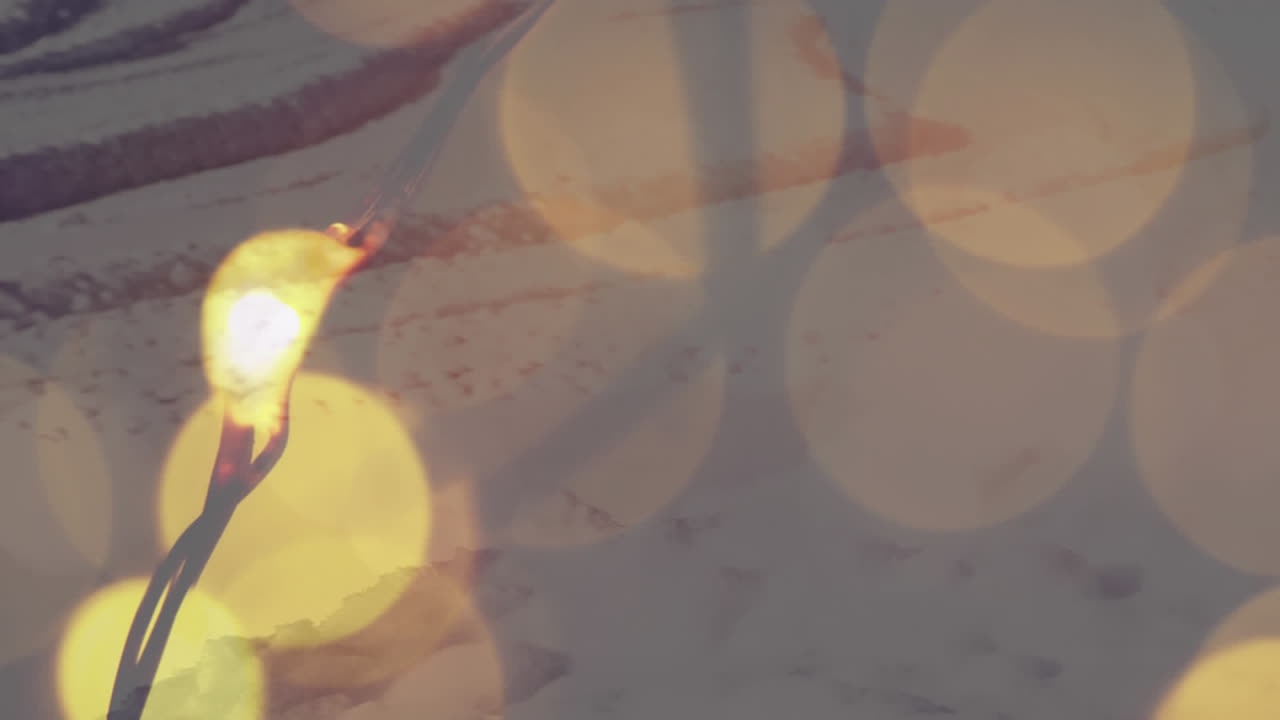 겨울 풍경에 대한 노란색 빛의 점의 디지털 구성