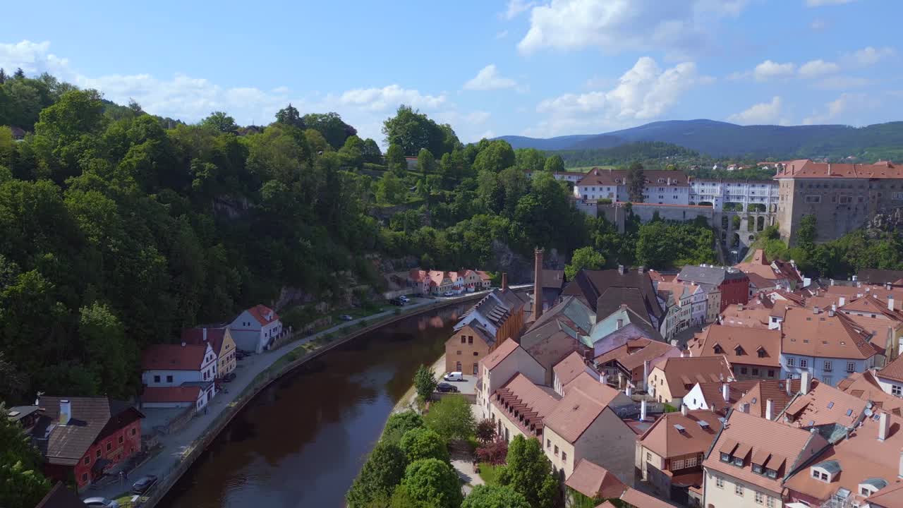 Gorgeous aerial top view flight Czech Republic historical Cesky Krumlov Vltava river in summer time 2023, world heritage in Bohemia