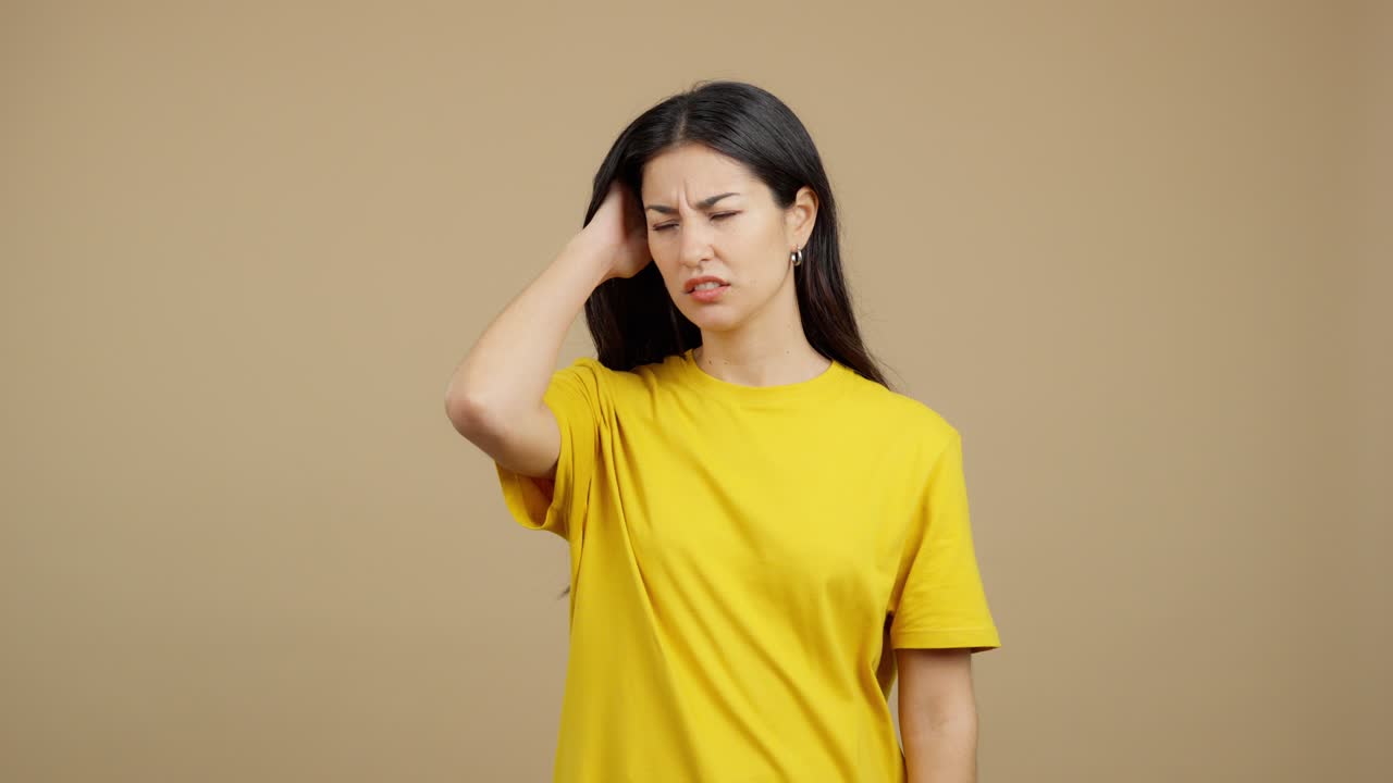 Young woman expressing confusion, thought, and slight frustration