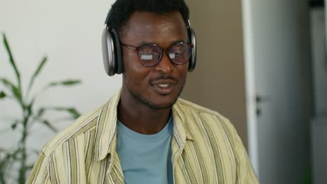 man listening to music with headphones