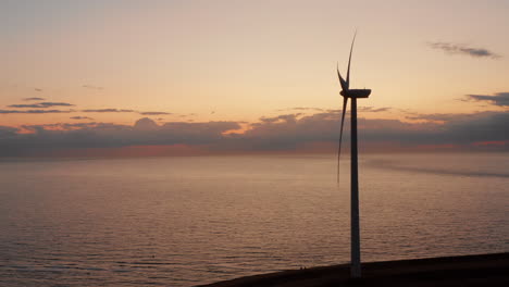 windturbines during sunset on the island neeltje jans, the netherlands