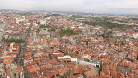 Aerial-View-of-Clérigos-Tower-and-City-of-Porto,-Portugal