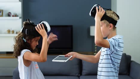 kids using virtual reality headset in living room