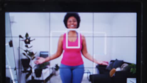 African-american-female-plus-size-vlogger-recording-a-video-about-working-out