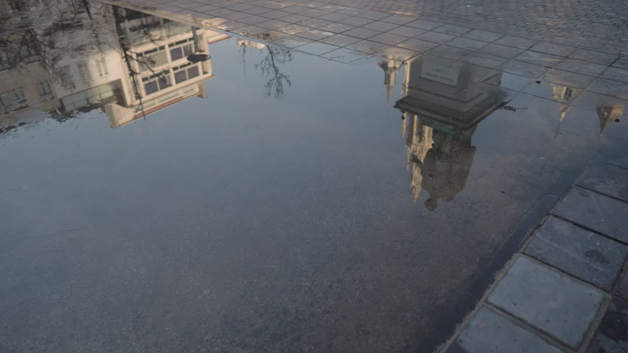 Reflection of Architecture in a Puddle