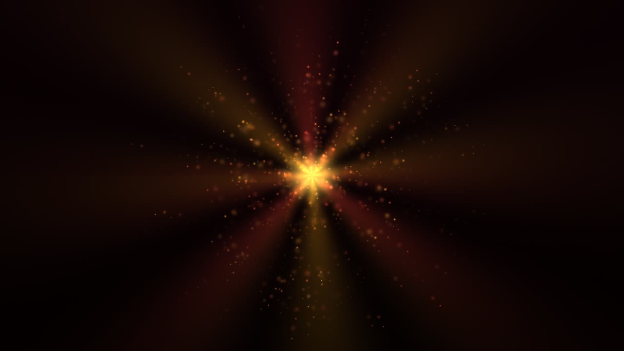 A radiant yellow core with red and orange rays bursts outward against a black background, surrounded by drifting particles and subtle color gradients