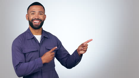 Pointing,-smile-and-man-in-a-studio-with-mockup