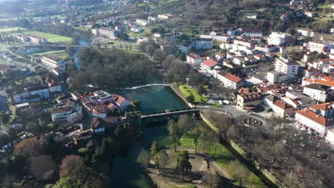 bridge over river vez or ponte da vila and town of arcos de valdevez in portugal, aerial establish