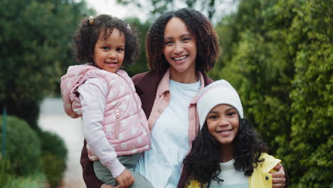 happy family portrait of mom and daughters
