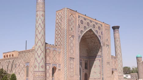 beautioful fascade of madrassa in registan square in samarkand, uzbekistan along the historic silk road