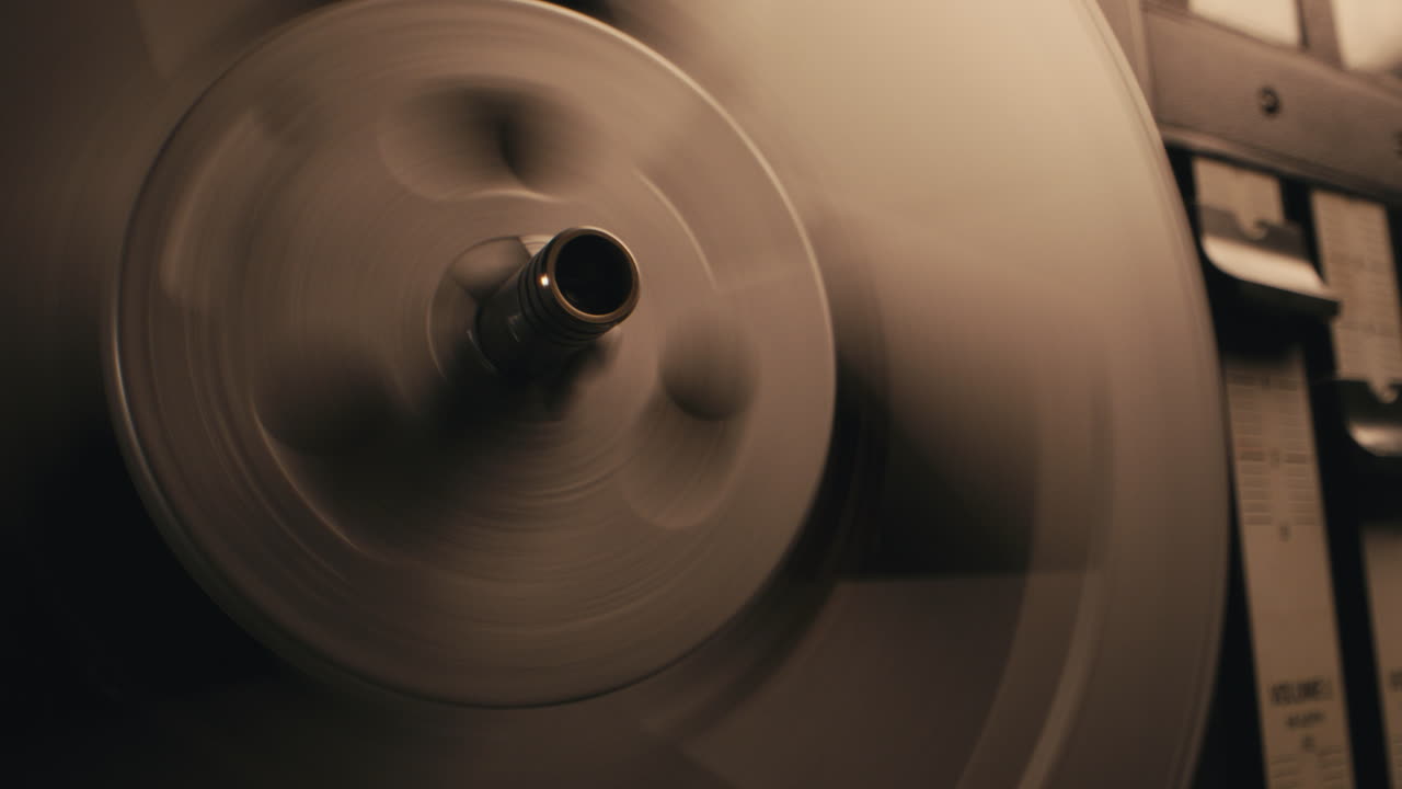 A vintage tape recorder in a blinking light