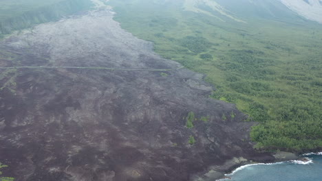 high aerial view over the destructive dried lava flow from a volcanic eruption on reunion island