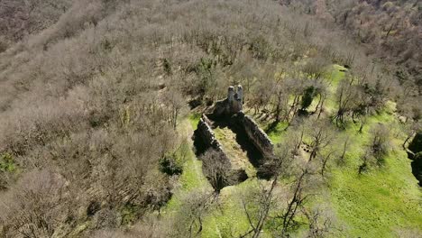 ruins of a tuscan church dating back to the middle ages, called the chiesaccia located in the ancient city of vitozza