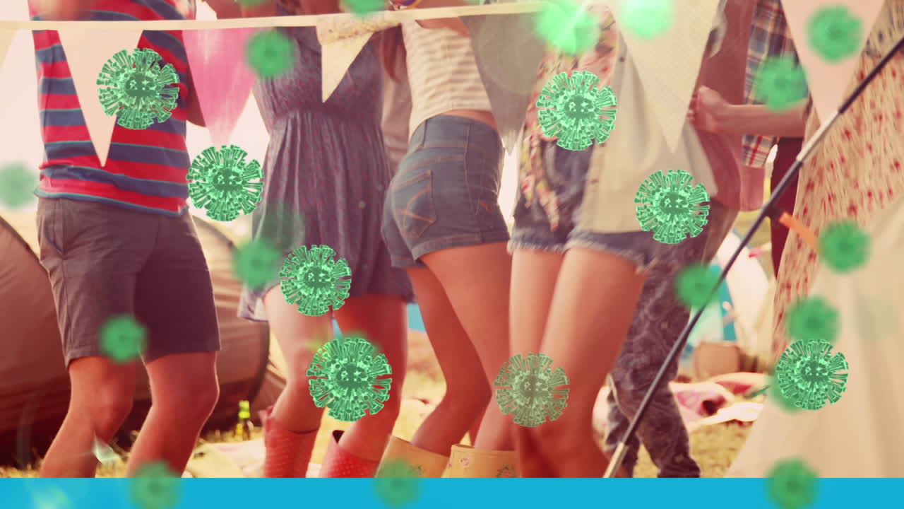 코로나19 세포가 배경에서 춤추는 친구 그룹을 상대로 움직이는 디지털 복합 비디오