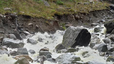 River-finding-new-ways-and-digging-through-the-dirt-and-soil-after-heavy-rain-and-flooding