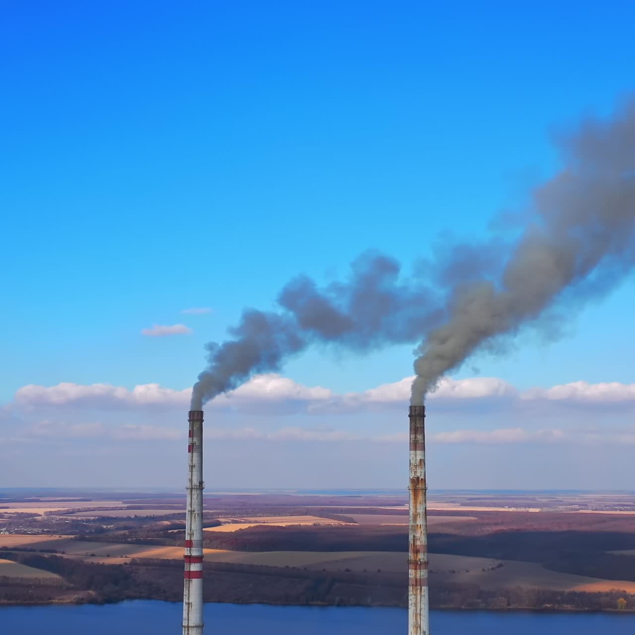 Smoking from factory tube. Toxic production company enterprise. Full length view