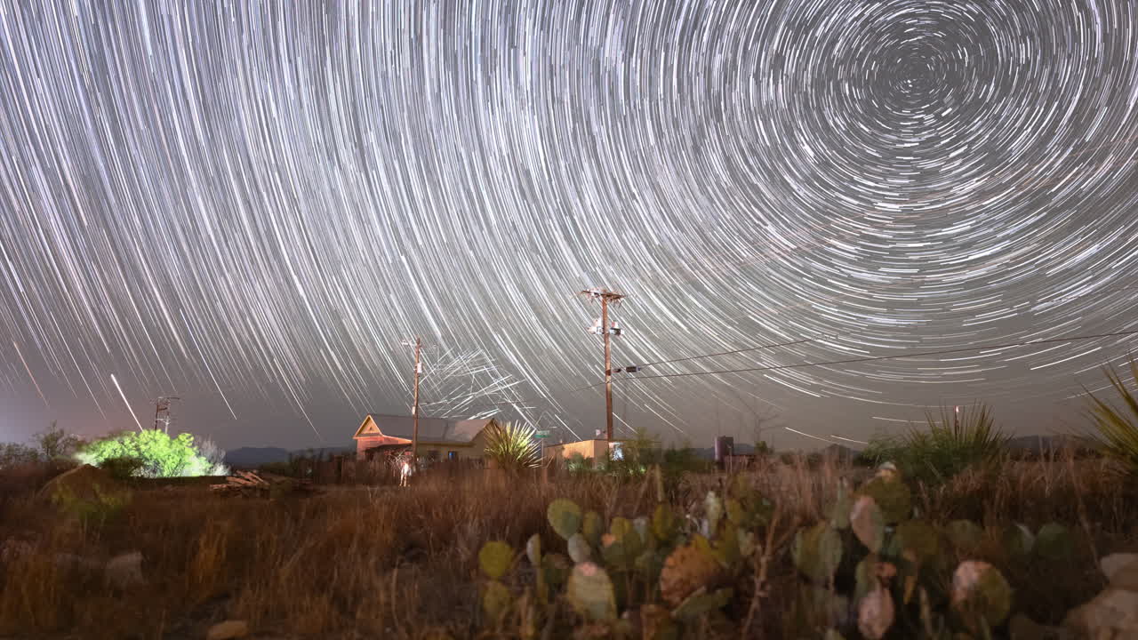 Stars trail in to long streaks over a west Texas landscape - Astro Time lapse