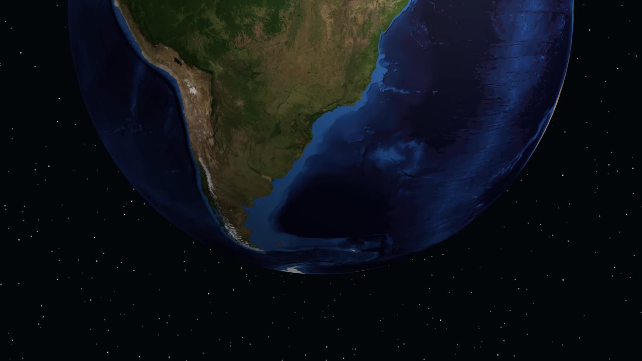 Digital earth rotates and zooms into South America, highlighting Coyhaique with location data text