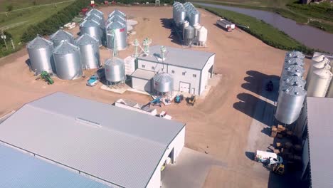 aerial view of the storage bins, warehouses, tractors and trailers of a cover seed agribusiness in nebraska usa, but exports seeds around the world