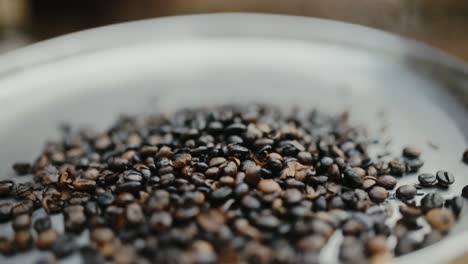 close-up slow motion shot of robusta coffee beans being roasted