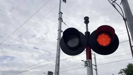 red traffic light signals on cloudy day under the 4k 2025 08 05 00 55 54 utc.mov | alert, audio, caution, city