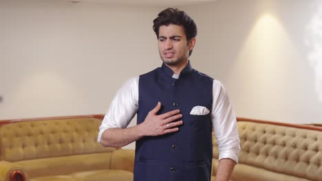 indian man having stomach acidity problem