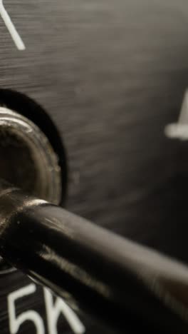 close-up of a 5k weight machine knob