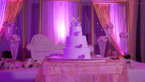 A-Wedding-Cake-under-colourful-lighting