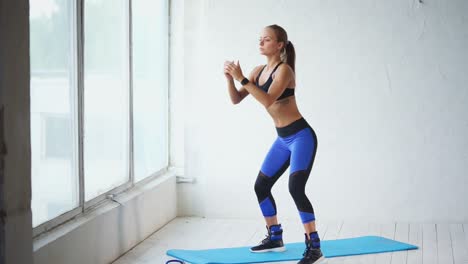 woman doing squats workout