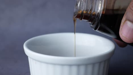 pouring syrup into a bowl