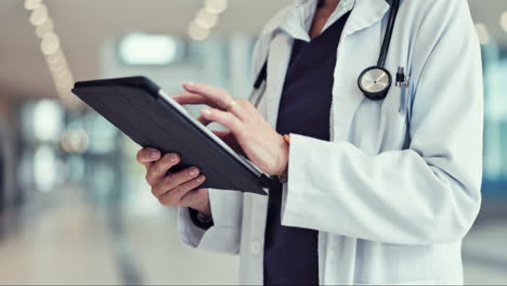 Doctor,-hands-and-tablet-in-healthcare-research