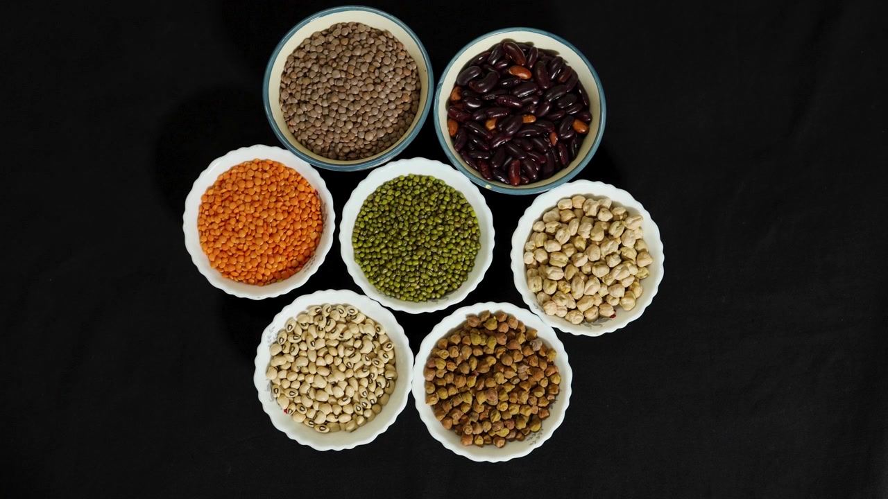 nutritious pulse collection arranged in bowls for healthy eating concept