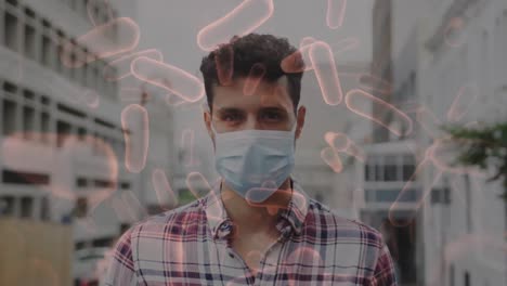animación de células de covid-19 moviéndose sobre un hombre con una máscara facial