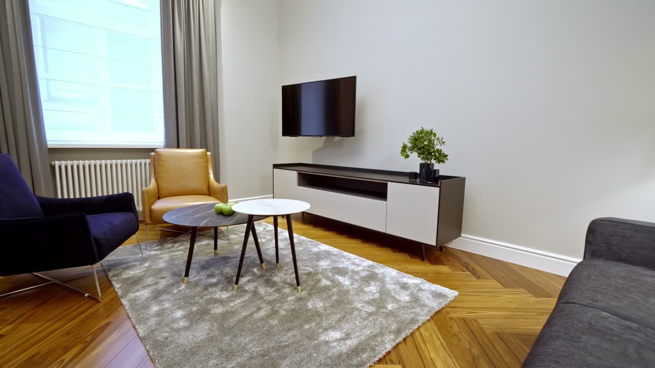 Elegant luxury living room featuring sophisticated decor and rich, stylish design elements