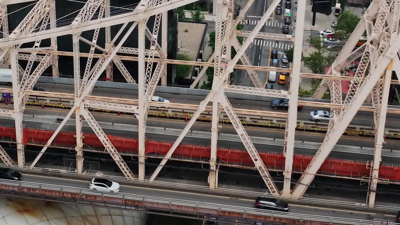Stunning aerial view of a busy New York City bridge and traffic below