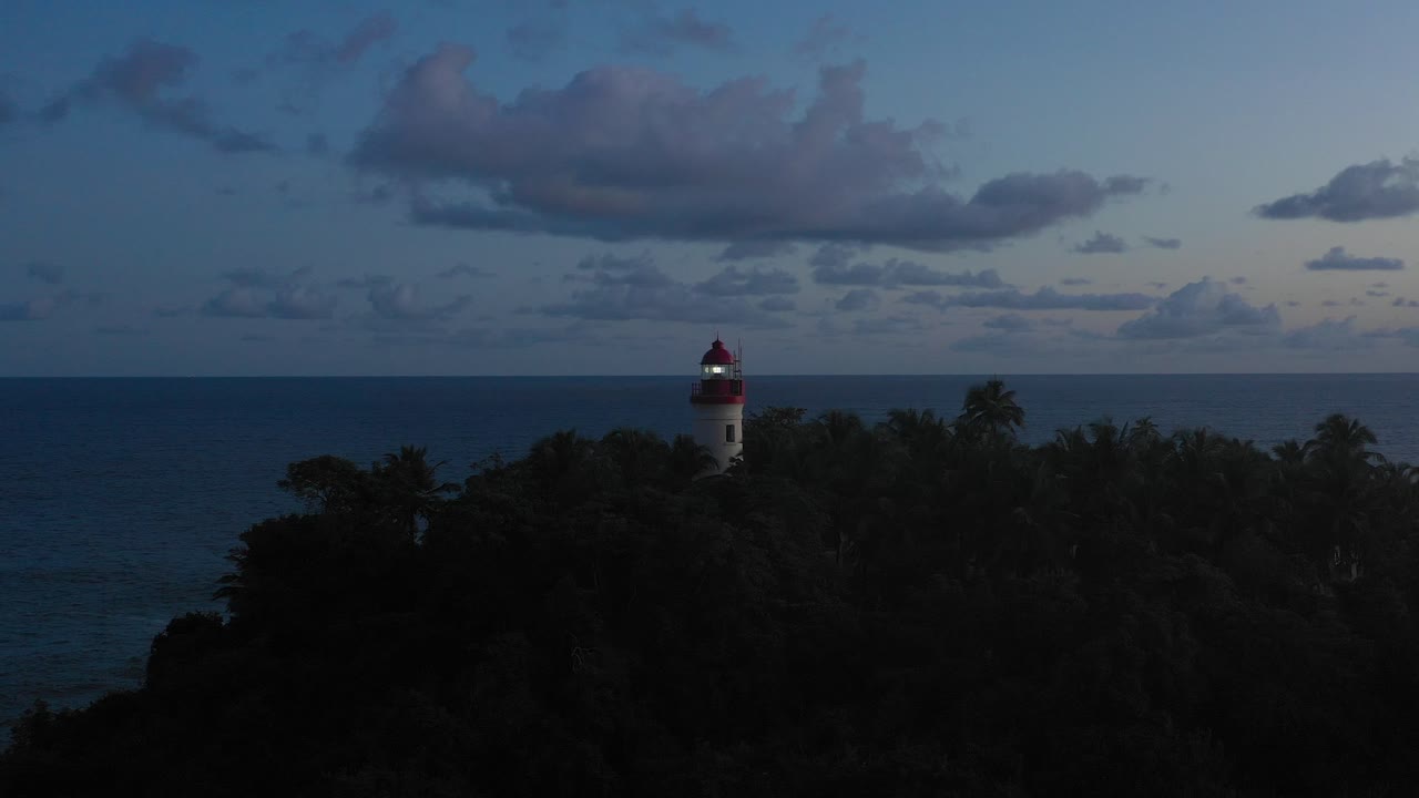 Cape Three Points Lighthouse Ghana West Africa Aerial Footage after Sunset