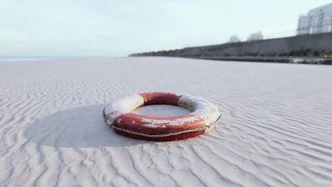 lonely lifebuoy on a deserted beach