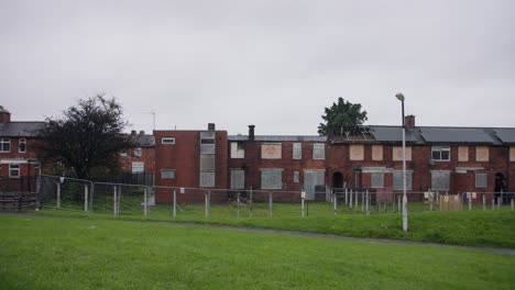 wide shot of multiple fire damaged homes in blackburn, uk