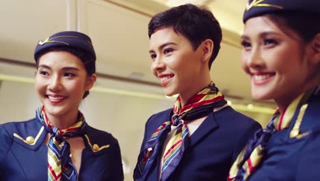 group of cabin crew or air hostess in airplane