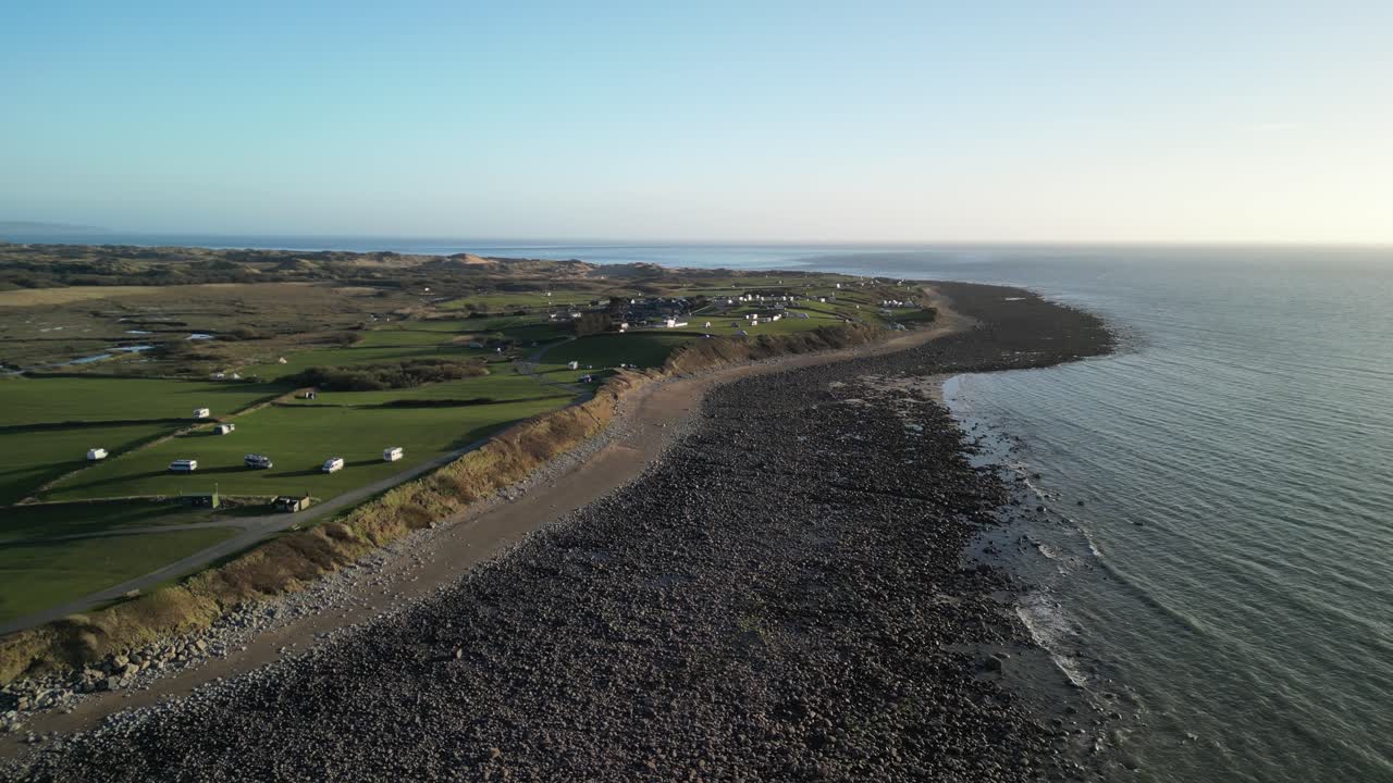 Shell Island fast drone flyover on a beautiful sunny spring late afternoon, Wales - UK