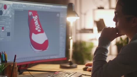 person designing a shoe in 3d cad software