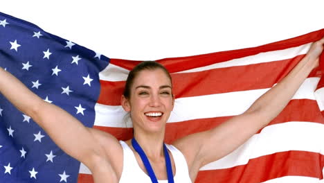 happy athlete holding american flag