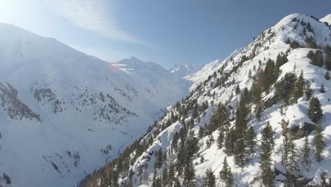 aerial reveal of a valley in livigno, italy
