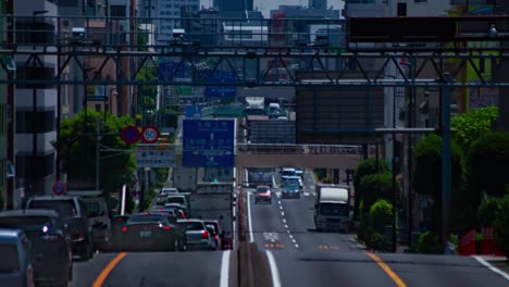 a timelapse of the traffic jam at the urban street in tokyo long shot