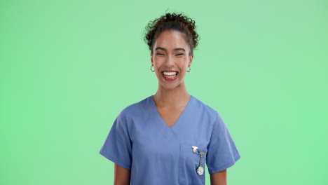 portrait of a happy female nurse in scrubs