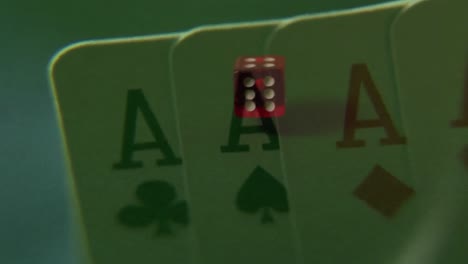 dice rolling over green table