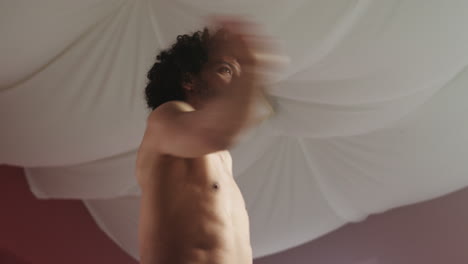 Young-man-dancing-in-a-classroom