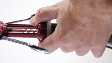 Opening-a-wine-or-champagne-bottle-with-a-cork-screw---vertical-orientation