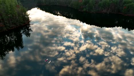 Paddle-boarding-on-Lake-Santeetlah,-North-Carolina-during-golden-hour