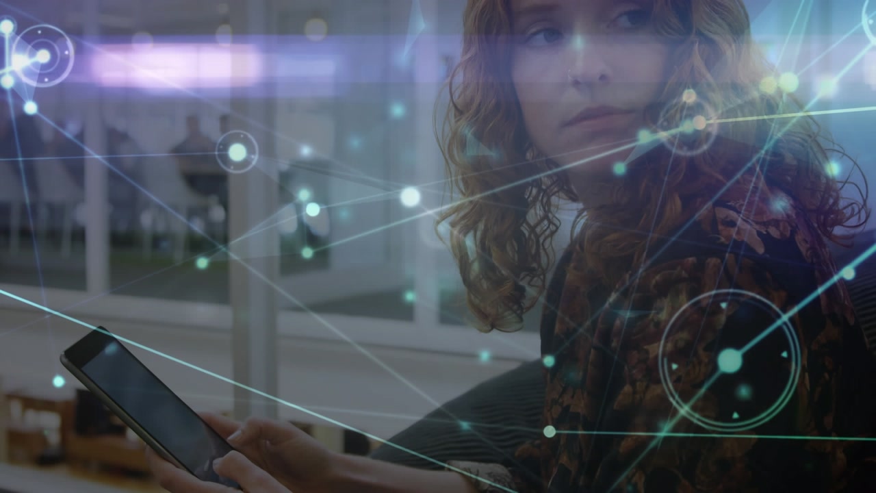 Animation of network of connections over caucasian businesswoman using smartphone